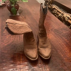 Light brown women’s cowgirl boots, leather